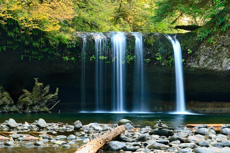Travellers at a scenic waterfall